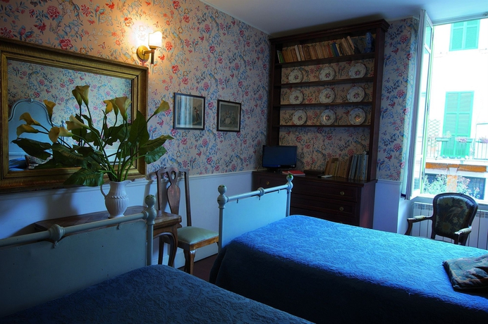 Imagen de la habitación del Casa de Huéspedes Arco Dei Tolomei. Foto 10