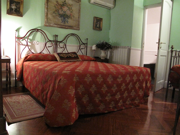 Imagen de la habitación del Casa de Huéspedes Arco Dei Tolomei. Foto 11