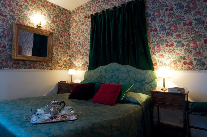 Imagen de la habitación del Casa de Huéspedes Arco Dei Tolomei. Foto 12