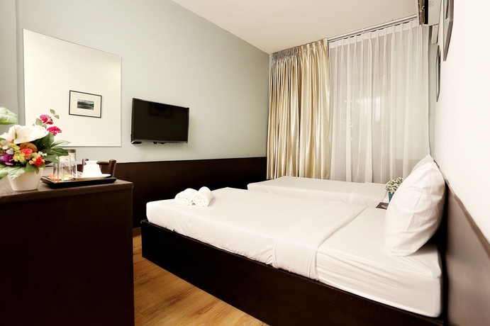 Imagen de la habitación del Casa de Huéspedes Baan Namtarn. Foto 10