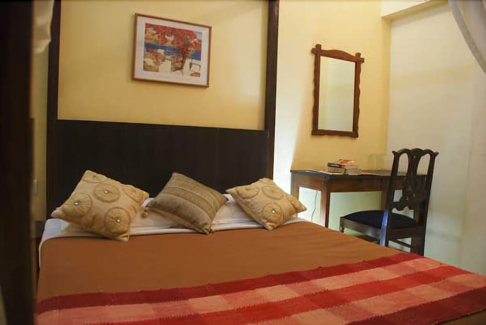 Imagen de la habitación del Casa de Huéspedes Banyan Tree Courtyard. Foto 7