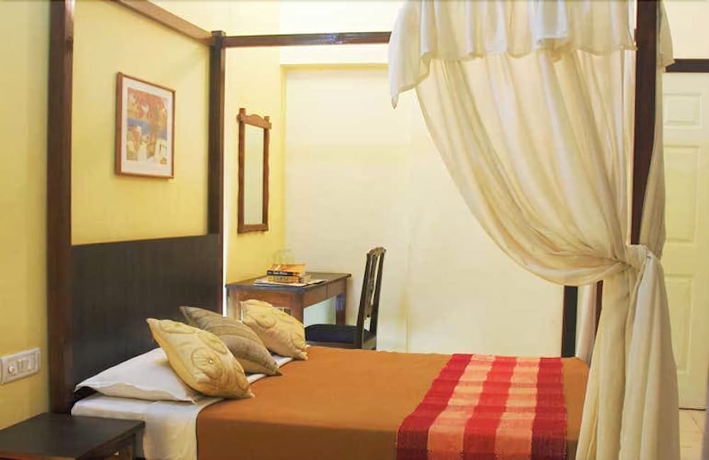 Imagen de la habitación del Casa de Huéspedes Banyan Tree Courtyard. Foto 8