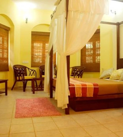 Imagen de la habitación del Casa de Huéspedes Banyan Tree Courtyard. Foto 9