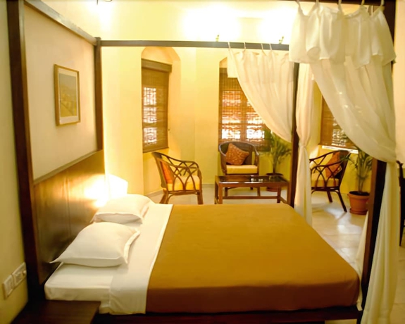 Imagen de la habitación del Casa de Huéspedes Banyan Tree Courtyard. Foto 11