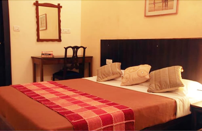 Imagen de la habitación del Casa de Huéspedes Banyan Tree Courtyard. Foto 12