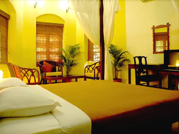 Imagen de la habitación del Casa de Huéspedes Banyan Tree Courtyard. Foto 13