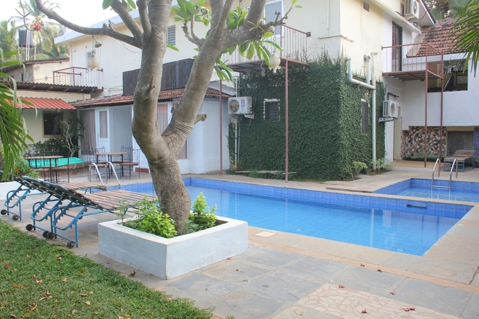 Imagen de la piscina del Casa de Huéspedes Banyan Tree Courtyard. Foto 17