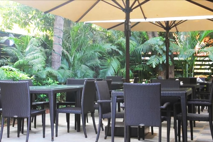 Imagen del bar/restaurante del Casa de Huéspedes Banyan Tree Courtyard. Foto 5
