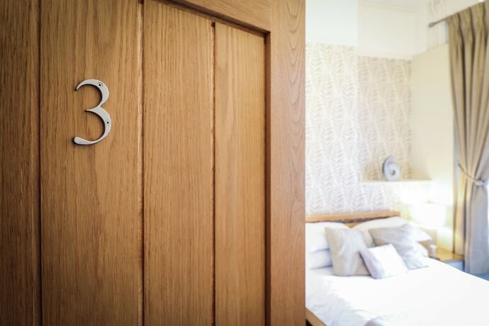 Imagen de la habitación del Casa de Huéspedes Beach Front Guest House. Foto 15