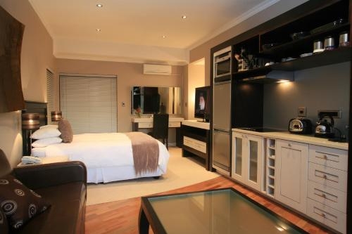 Imagen de la habitación del Casa de Huéspedes Boardwalk Lodge. Foto 8