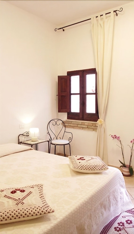 Imagen de la habitación del Casa de Huéspedes Cagliari Castello Affittacamere. Foto 7