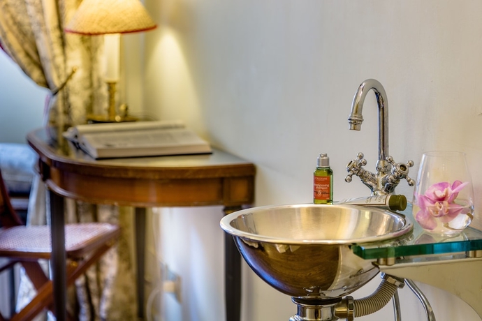 Imagen de la habitación del Casa de Huéspedes Casa Heberart Guest House Capo Le Case. Foto 15