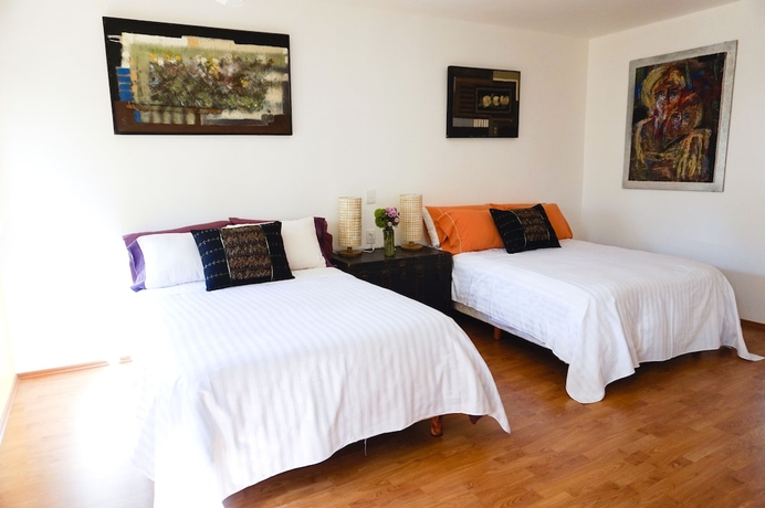 Imagen de la habitación del Casa de Huéspedes Casa Jacinta Guest House. Foto 7