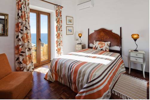 Imagen de la habitación del Casa de Huéspedes Castelo, Carvoeiro. Foto 10