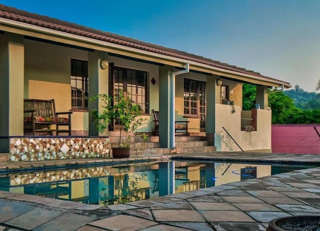 Imagen de la piscina del Casa de Huéspedes Chez Vincent. Foto 19