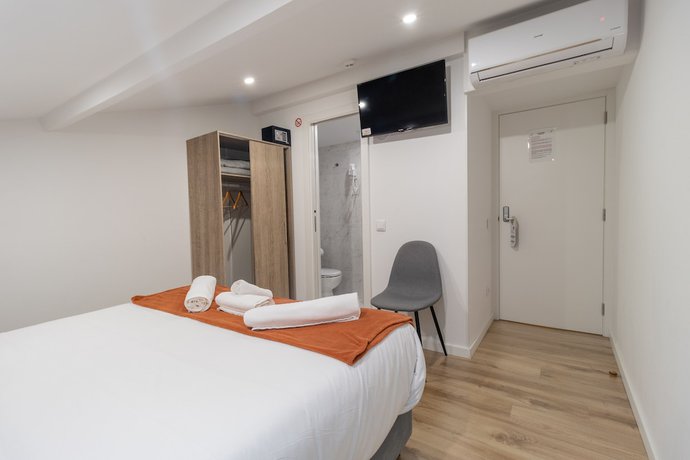 Imagen de la habitación del Casa de Huéspedes Coimbra City Charm. Foto 11