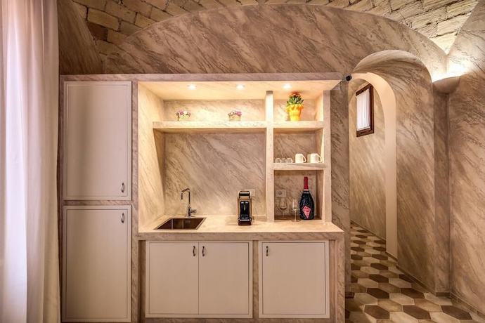 Imagen de los interiores del Casa de Huéspedes Colosseo Accomodation Room Guest House. Foto 19