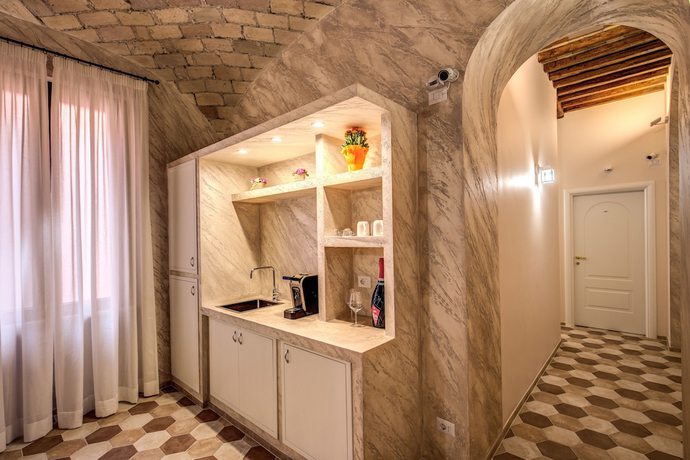 Imagen de los interiores del Casa de Huéspedes Colosseo Accomodation Room Guest House. Foto 20