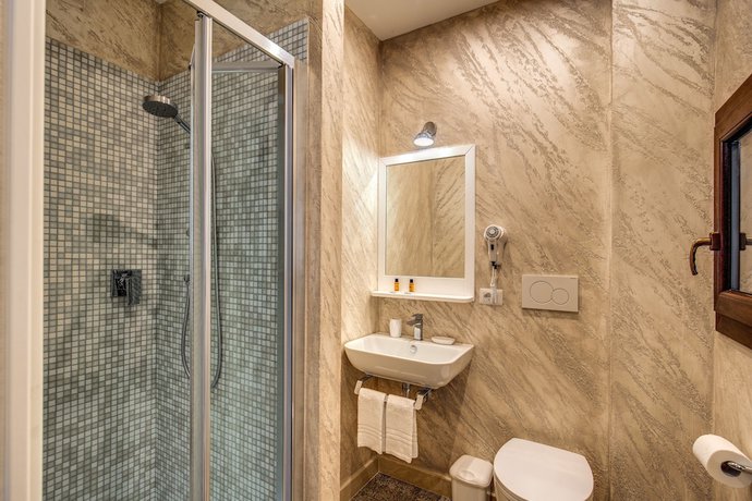 Imagen de la habitación del Casa de Huéspedes Colosseo Accomodation Room Guest House. Foto 6