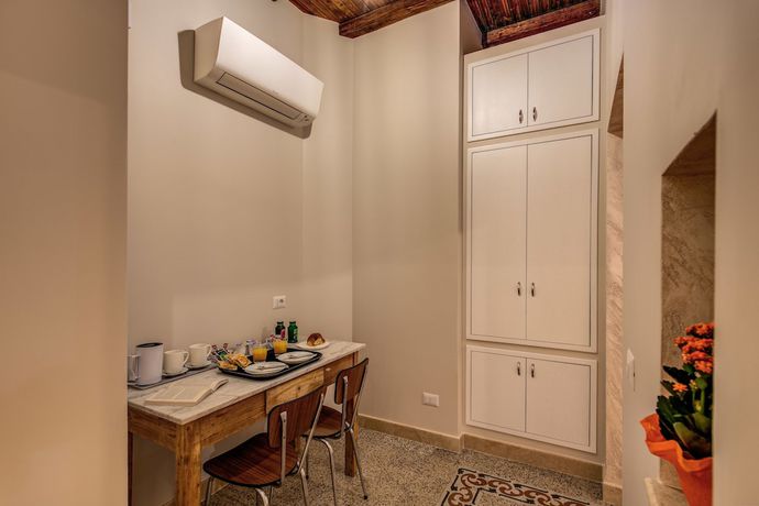 Imagen de la habitación del Casa de Huéspedes Colosseo Accomodation Room Guest House. Foto 7