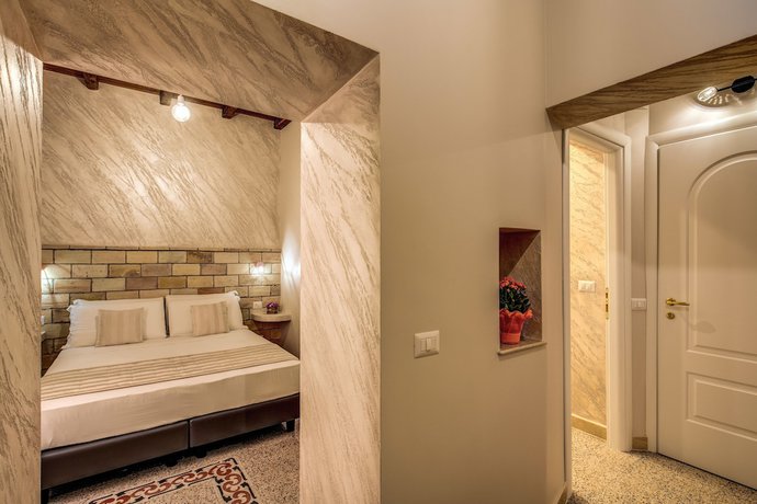 Imagen de la habitación del Casa de Huéspedes Colosseo Accomodation Room Guest House. Foto 11