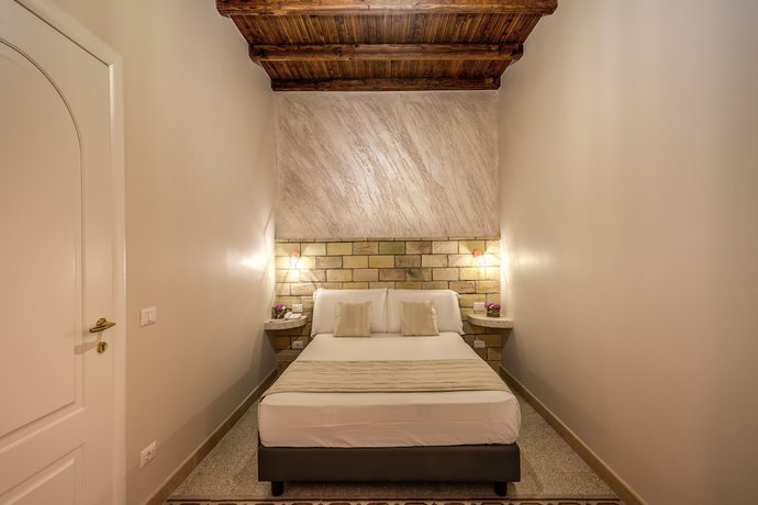 Imagen de la habitación del Casa de Huéspedes Colosseo Accomodation Room Guest House. Foto 13