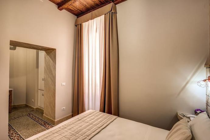 Imagen de la habitación del Casa de Huéspedes Colosseo Accomodation Room Guest House. Foto 16