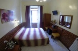 Imagen de la habitación del Casa de Huéspedes Cristina Dependance. Foto 7