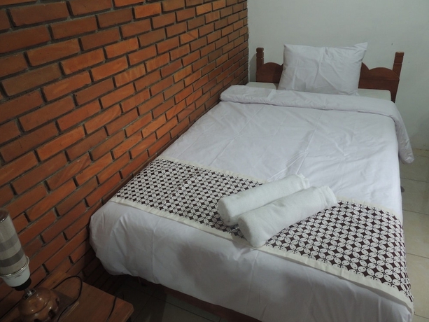 Imagen de la habitación del Casa de Huéspedes Dalem Sudarno Syariah by Ndalem Beong. Foto 2