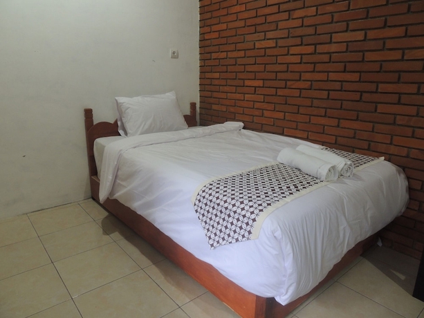 Imagen de la habitación del Casa de Huéspedes Dalem Sudarno Syariah by Ndalem Beong. Foto 5