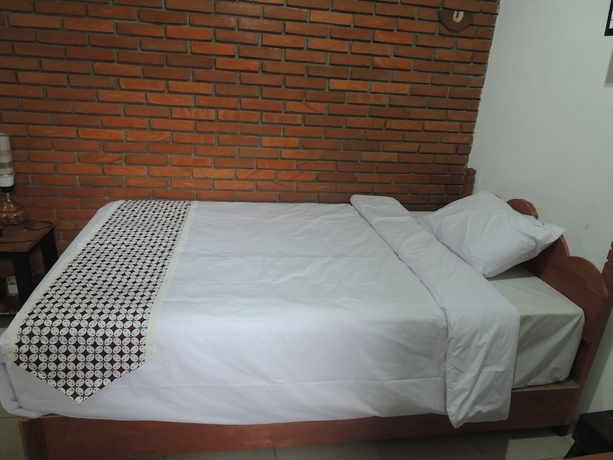 Imagen de la habitación del Casa de Huéspedes Dalem Sudarno Syariah by Ndalem Beong. Foto 6