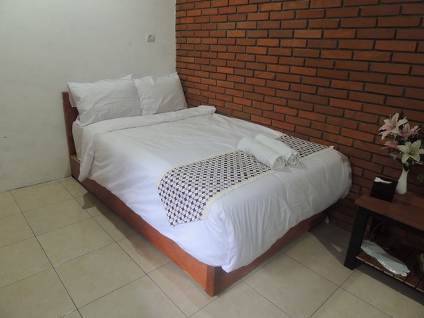 Imagen de la habitación del Casa de Huéspedes Dalem Sudarno Syariah by Ndalem Beong. Foto 14