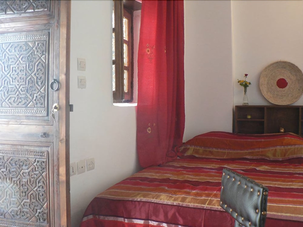 Imagen de la habitación del Casa de Huéspedes Dar Tamo. Foto 11