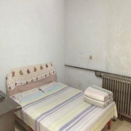 Imagen de la habitación del Casa de Huéspedes Dezhou Xinlong. Foto 6