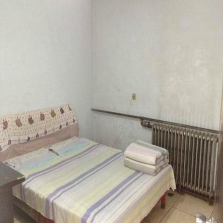 Imagen de la habitación del Casa de Huéspedes Dezhou Xinlong. Foto 7