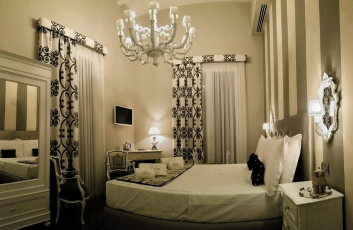 Imagen de la habitación del Casa de Huéspedes Dimora Bellini residenza d' epoca. Foto 6