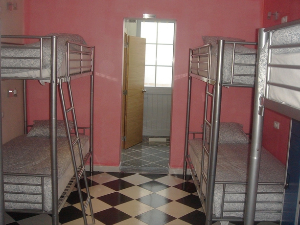 Imagen de la habitación del Casa de Huéspedes Downtown Guest House. Foto 16