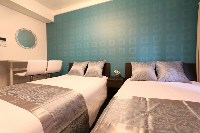 Imagen de la habitación del Casa de Huéspedes Elizabeth Garden Shinsaibashi. Foto 17