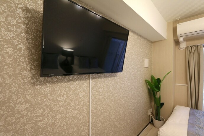 Imagen de la habitación del Casa de Huéspedes Elizabeth Garden Shinsaibashi. Foto 19
