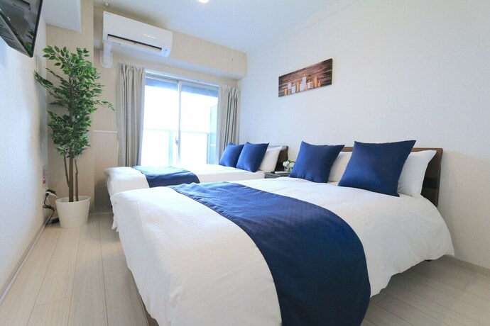 Imagen de la habitación del Casa de Huéspedes Elizabeth Garden Shinsaibashi. Foto 26