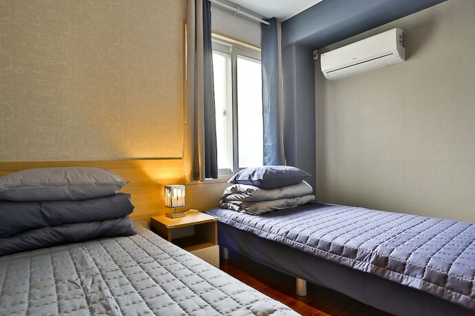 Imagen de la habitación del Casa de Huéspedes Ezstay Nampo. Foto 15