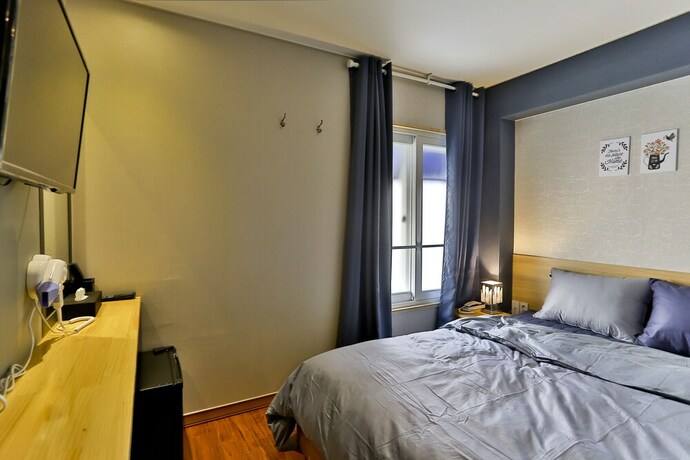 Imagen de la habitación del Casa de Huéspedes Ezstay Nampo. Foto 29