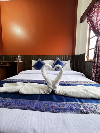 Imagen de la habitación del Casa de Huéspedes Family, Varanasi. Foto 7
