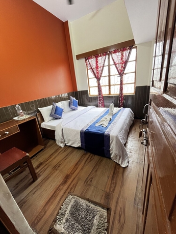 Imagen de la habitación del Casa de Huéspedes Family, Varanasi. Foto 9
