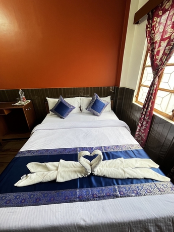 Imagen de la habitación del Casa de Huéspedes Family, Varanasi. Foto 13