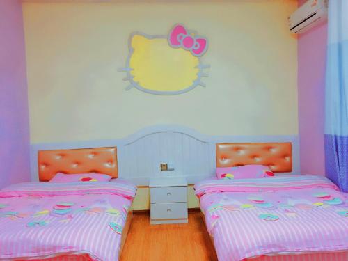 Imagen de la habitación del Casa de Huéspedes Fenghuang Xianhou Time Boutique. Foto 7