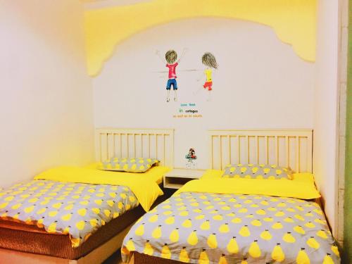 Imagen de la habitación del Casa de Huéspedes Fenghuang Xianhou Time Boutique. Foto 8