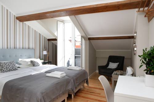 Imagen de la habitación del Casa de Huéspedes Flores Guest House. Foto 3