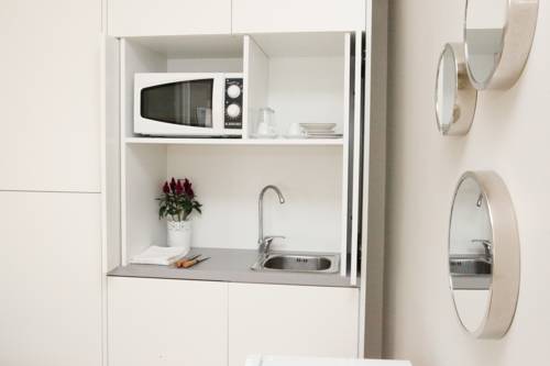 Imagen de la habitación del Casa de Huéspedes Flores Guest House. Foto 4