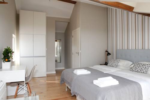 Imagen de la habitación del Casa de Huéspedes Flores Guest House. Foto 16